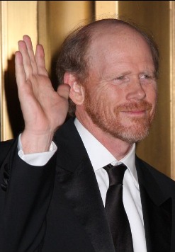 Ron Howard holding up his hand